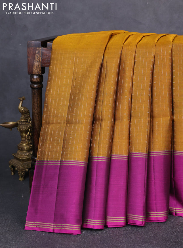 Pure soft silk saree dark mustard and magenta pink with allover zari weaves and long rettapet zari woven border