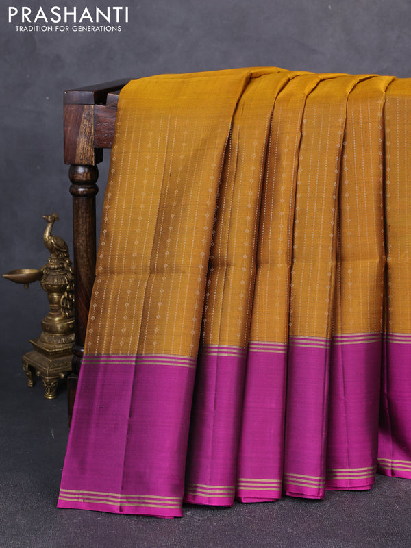 Pure soft silk saree dark mustard and magenta pink with allover zari weaves and long rettapet zari woven border