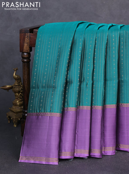 Pure soft silk saree peacock green and lavender with allover zari weaves and long rettapet zari woven border