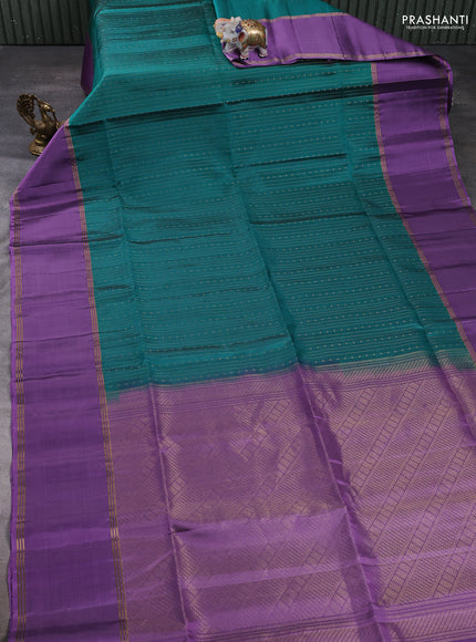 Pure soft silk saree peacock green and lavender with allover zari weaves and long rettapet zari woven border