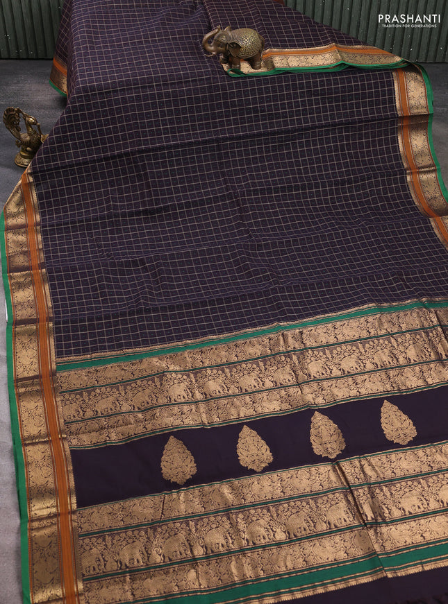 Kanchi cotton saree jamun shade and green with allover thread checks & buttas and zari woven border