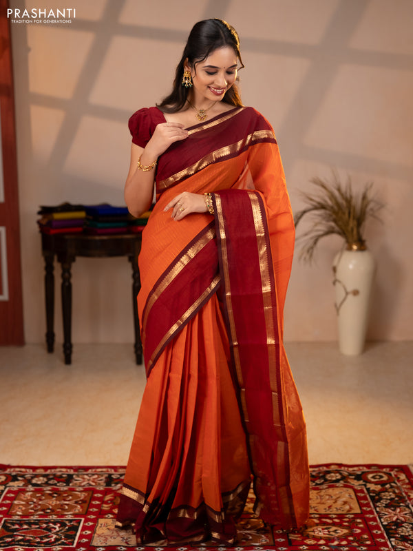 Kanchi cotton saree sunset orange and deep maroon with allover zari stripe pattern and rettapet zari woven border