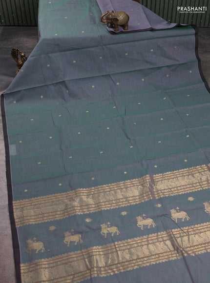 Kanchi cotton saree greyish green with zari woven buttas and piping border