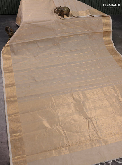 Kanchi cotton saree beige with allover zari stripe pattern and zari woven border