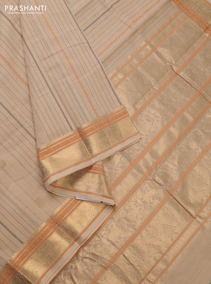 Kanchi cotton saree beige with allover thread stripe & zari woven buttas and zari woven border