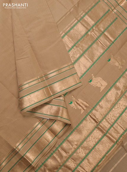 Kanchi cotton saree sandal with allover zari stripe pattern and zari woven border