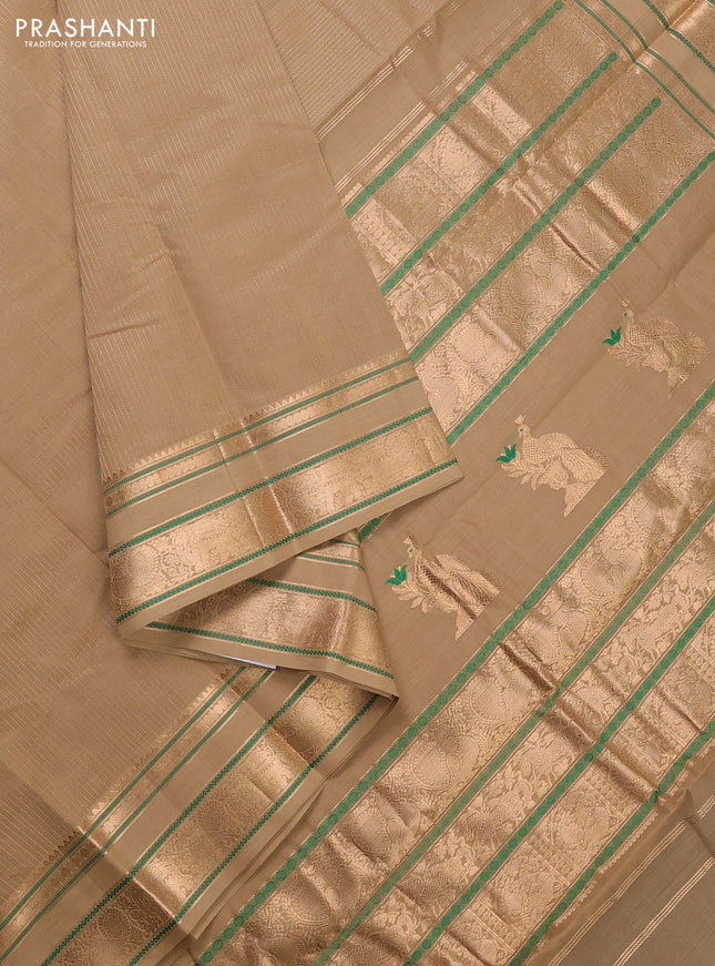 Kanchi cotton saree sandal with allover zari stripe pattern and zari woven border