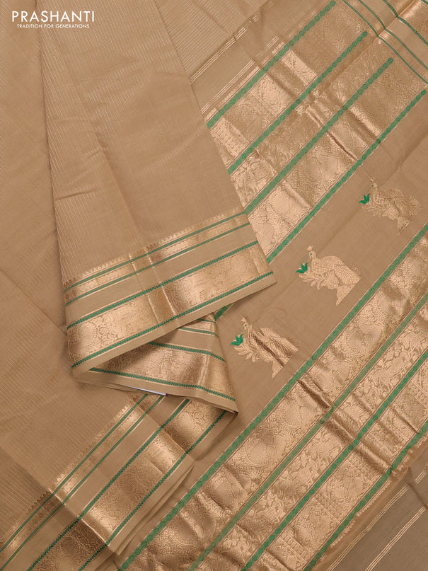 Kanchi cotton saree sandal with allover zari stripe pattern and zari woven border