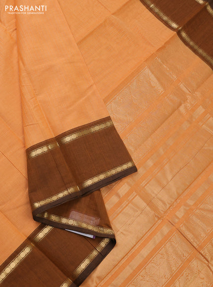 Kanchi cotton saree pale orange and dark mustard with allover zari stripe pattern and rettapet zari woven border