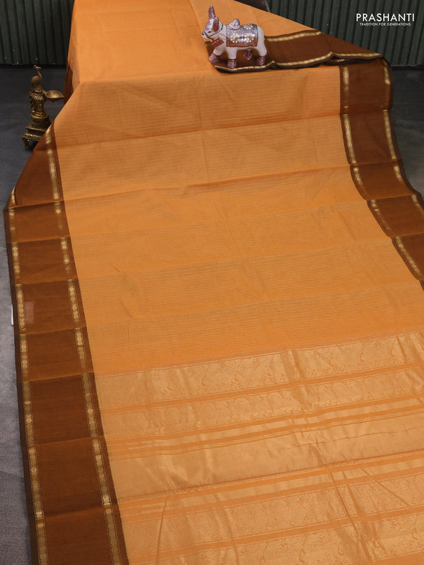 Kanchi cotton saree pale orange and dark mustard with allover zari stripe pattern and rettapet zari woven border
