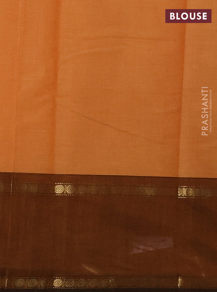 Kanchi cotton saree pale orange and dark mustard with allover zari stripe pattern and rettapet zari woven border