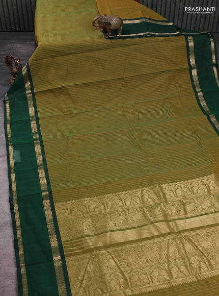 Kanchi cotton saree mehendi green and bottle green with allover zari stripe pattern and rettapet zari woven border