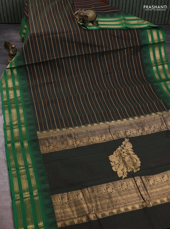 Kanchi cotton saree bottle green and green with allover thread weaves and zari woven border