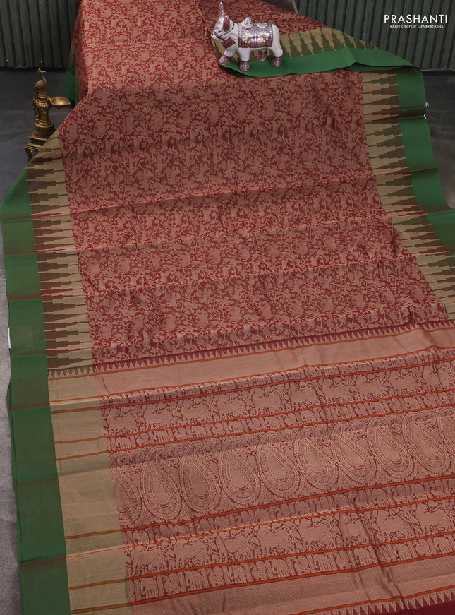 Kanchi cotton saree maroon and green with allover self emboss and temple design simple border