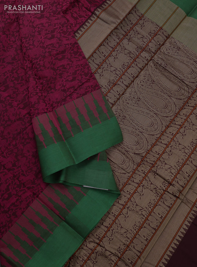 Kanchi cotton saree magenta pink and green with allover self emboss and temple design simple border