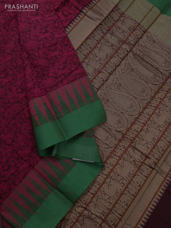 Kanchi cotton saree magenta pink and green with allover self emboss and temple design simple border