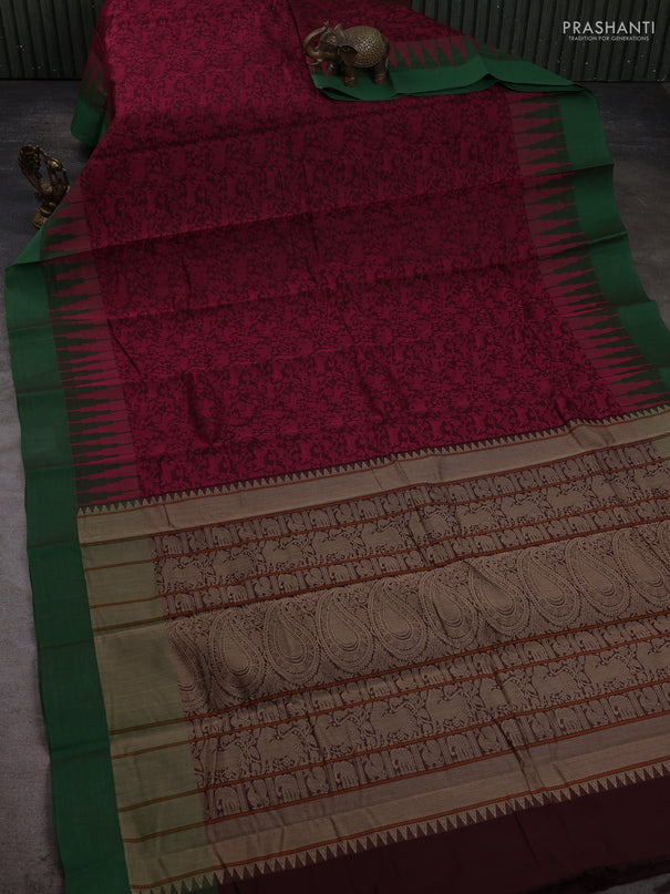 Kanchi cotton saree magenta pink and green with allover self emboss and temple design simple border