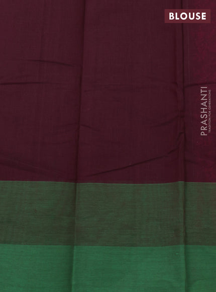 Kanchi cotton saree magenta pink and green with allover self emboss and temple design simple border