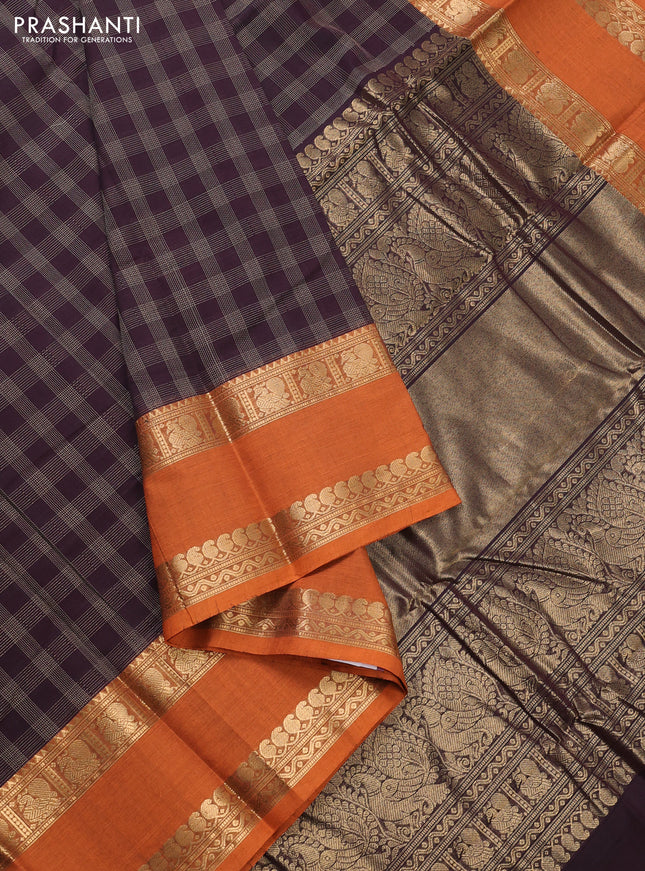 Kanchi cotton saree jamun shade and rust shade with allover thread checked pattern and rettapet zari woven border