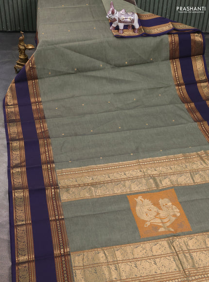 Kanchi cotton saree pastel green and navy blue with zari woven buttas and rettapet zari woven border