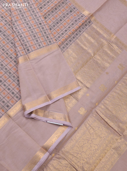 Kanchi cotton saree sandal and pastel pink with allover checks & thread woven buttas and long rettapet zari woven border