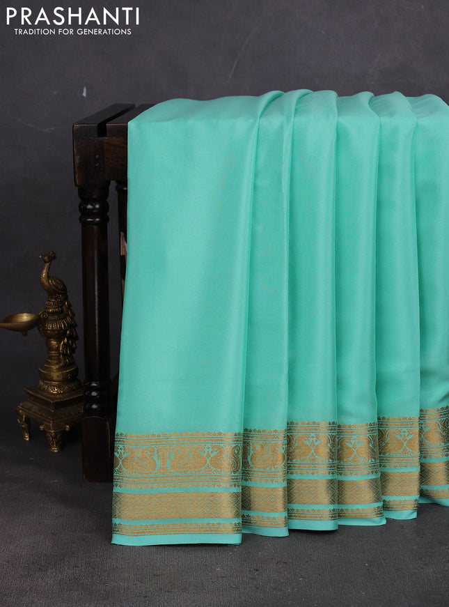 Pure mysore silk saree teal green with plain body and long zari woven border
