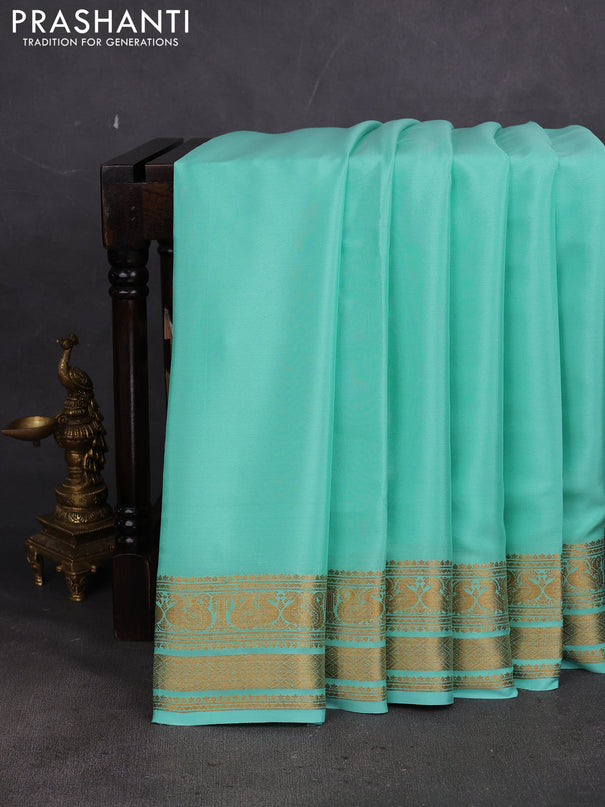 Pure mysore silk saree teal green with plain body and long zari woven border