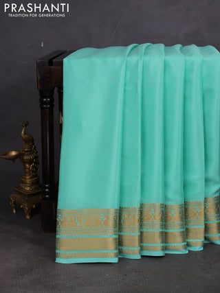 Pure mysore silk saree teal green with plain body and long zari woven border