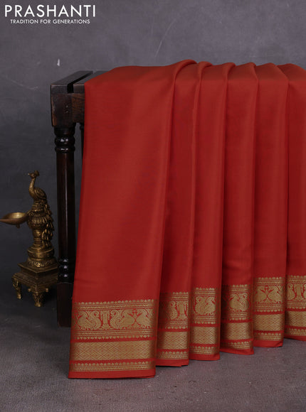 Pure mysore silk saree rust shade with plain body and long zari woven border