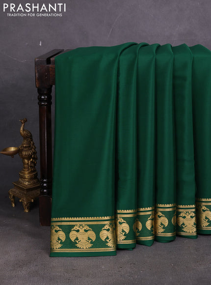 Pure mysore silk saree bottle green with plain body and paisley zari woven border