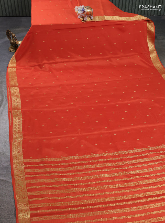 Pure mysore silk saree rust shade with allover zari woven buttas and zari woven border