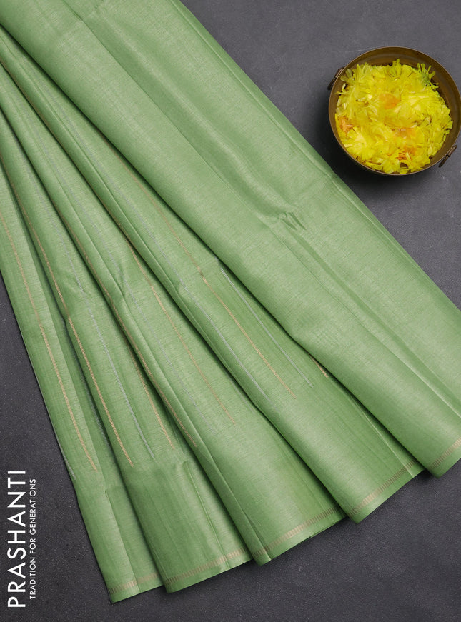 Semi tussar saree light green with allover silver & zari weaves pattern and simple zari woven border
