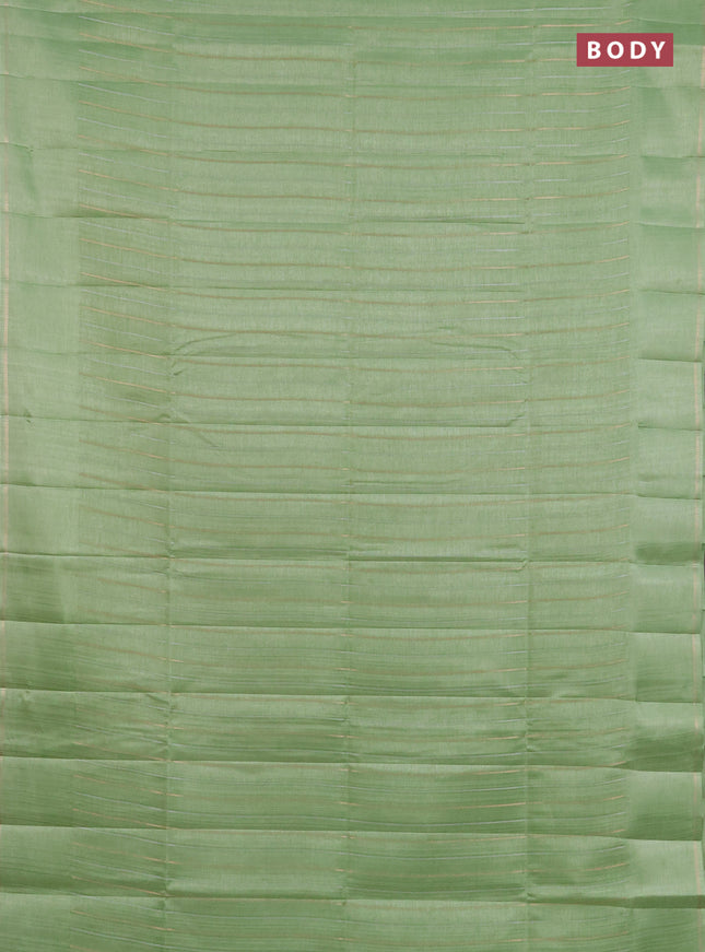 Semi tussar saree light green with allover silver & zari weaves pattern and simple zari woven border