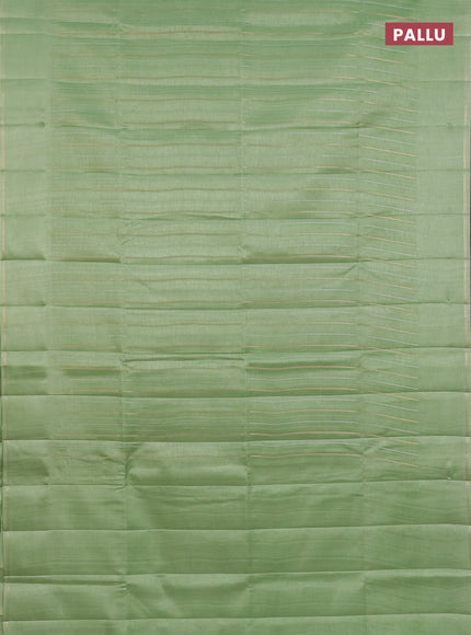 Semi tussar saree light green with allover silver & zari weaves pattern and simple zari woven border