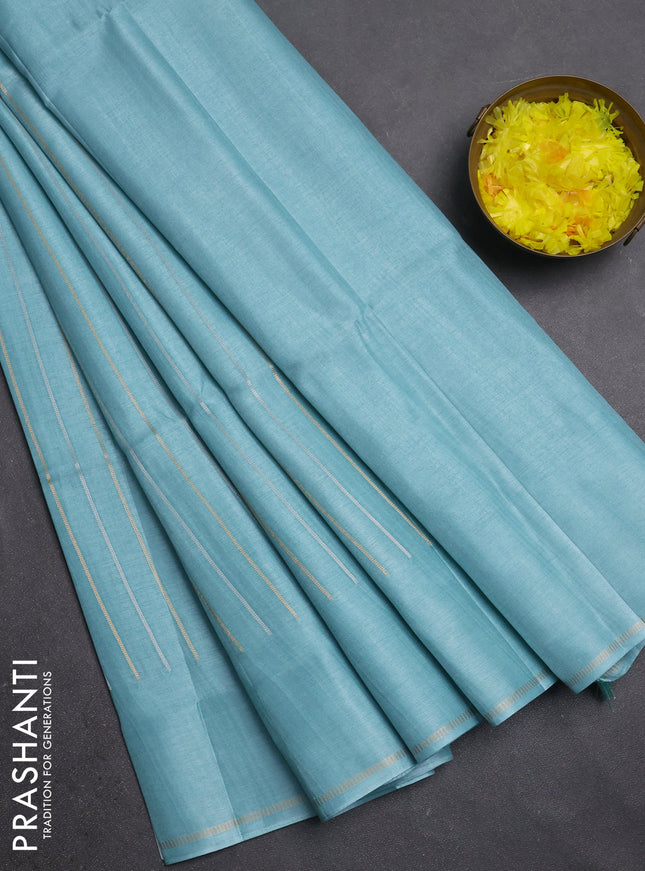 Semi tussar saree teal blue with allover silver & zari weaves pattern and simple zari woven border