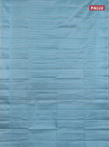 Semi tussar saree teal blue with allover silver & zari weaves pattern and simple zari woven border