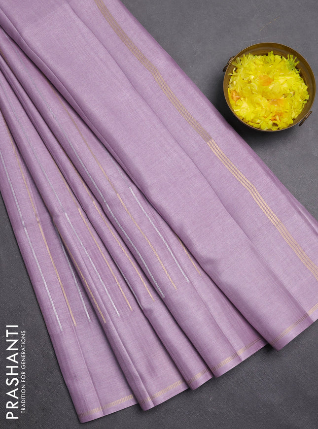 Semi tussar saree mild lavender with allover silver & zari weaves pattern and simple zari woven border