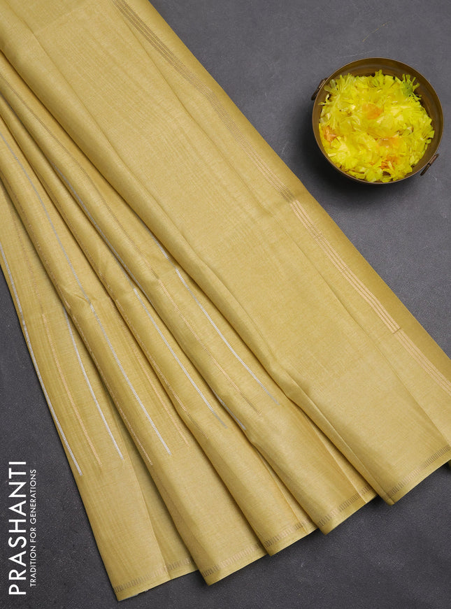 Semi tussar saree pale yellow with allover silver & zari weaves pattern and simple zari woven border