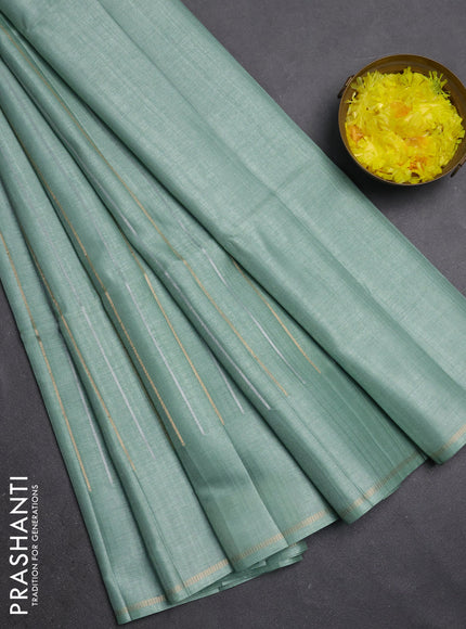 Semi tussar saree pastel green with allover silver & zari weaves pattern and simple zari woven border
