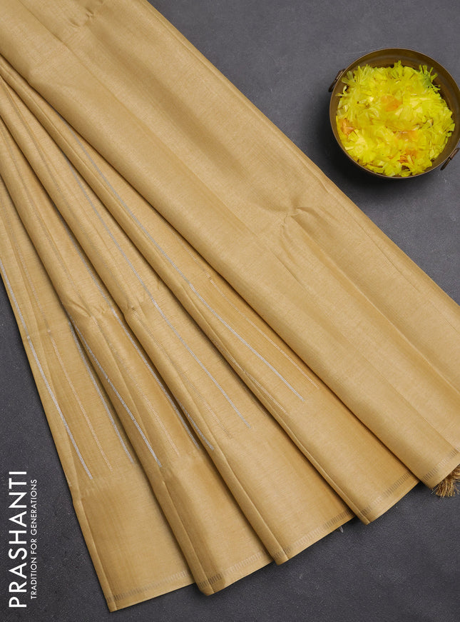 Semi tussar saree sandal with allover silver & zari weaves pattern and simple zari woven border