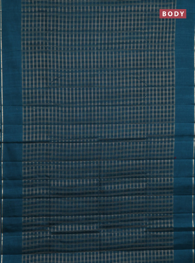 Semi tussar saree peacock green with allover zari checks and simple zari woven border