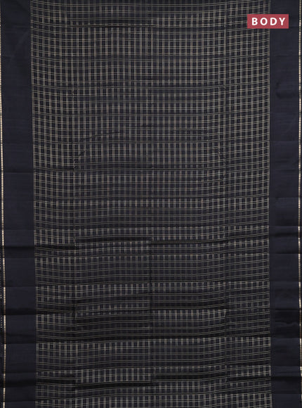 Semi tussar saree black with allover zari checks and simple zari woven border
