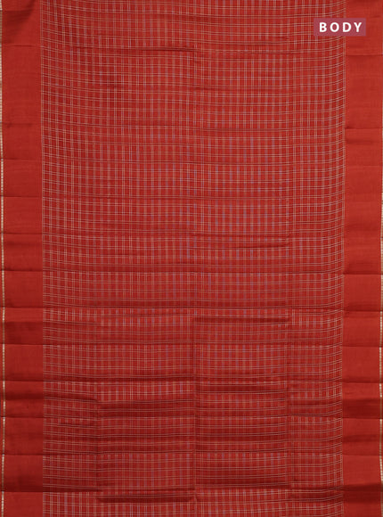 Semi tussar saree rust with allover zari checks and simple zari woven border