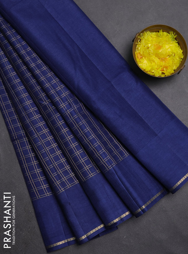 Semi tussar saree peacock blue with allover zari checks and simple zari woven border
