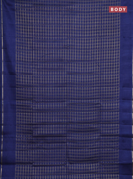 Semi tussar saree peacock blue with allover zari checks and simple zari woven border