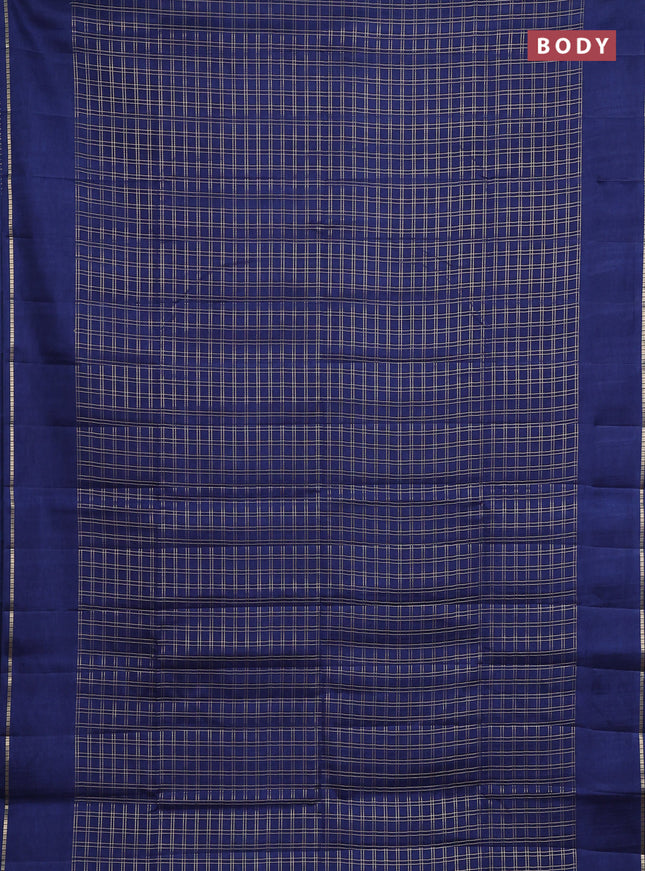 Semi tussar saree peacock blue with allover zari checks and simple zari woven border