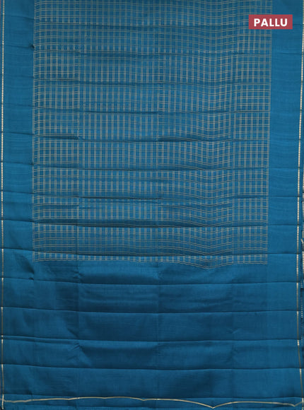 Semi tussar saree peacock green with allover zari checks and simple zari woven border
