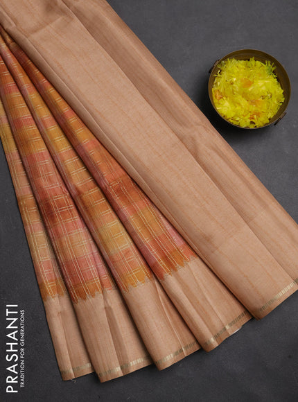 Semi tussar saree multi colour and pale orange with allover zari checks and simple zari woven border