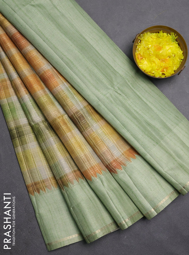 Semi tussar saree multi colour and pastel green with allover zari checks and simple zari woven border