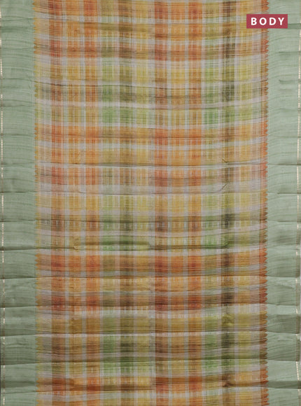 Semi tussar saree multi colour and pastel green with allover zari checks and simple zari woven border